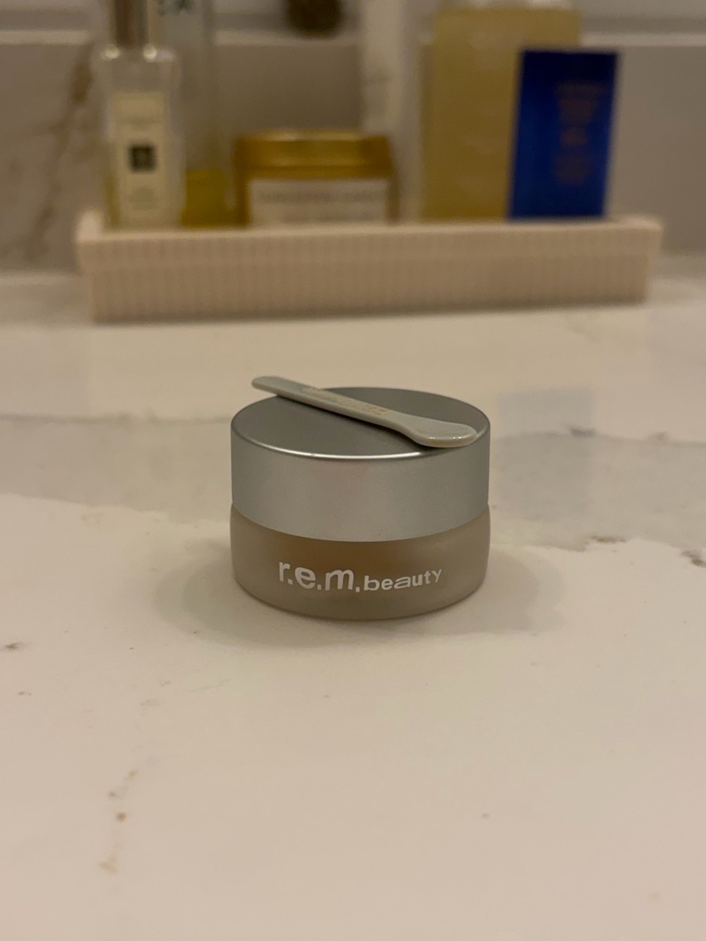 R. E. M. concealer shade 3W- used once. Wrong shade match. Excellent quality.